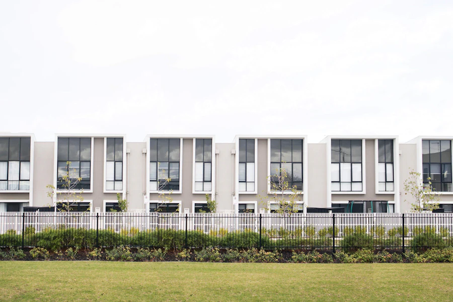 Row of contemporary townhouses with gardens